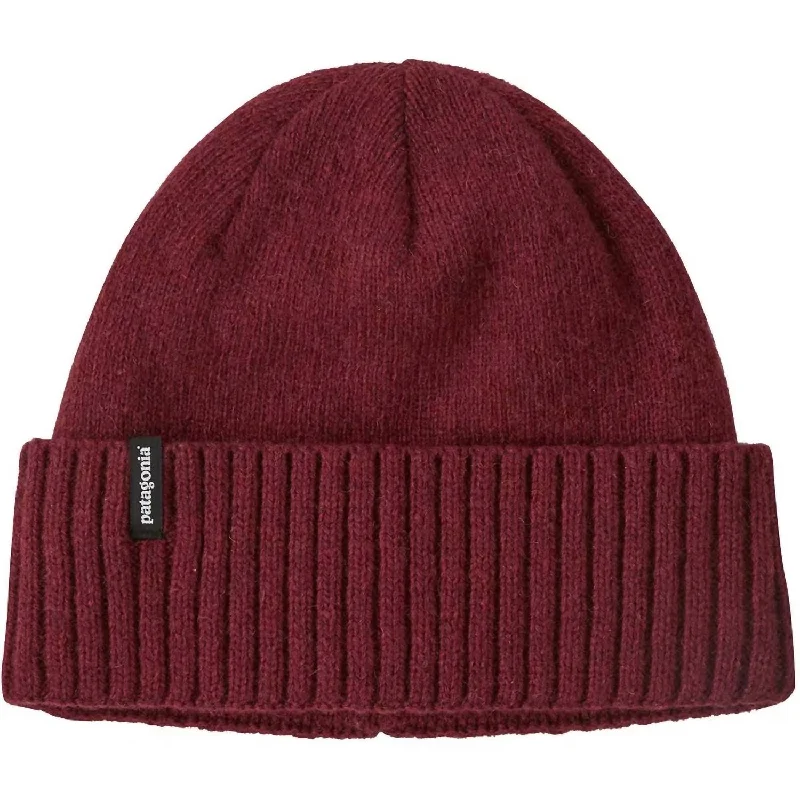 cozy fur-lined hats with adjustable straps for a secure fit in extreme weather Brodeo Beanie In Sequoia Red